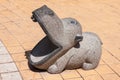 Sculpture Behemoth sitting by the fountain in the city Park of Baku, Azerbaijan. Royalty Free Stock Photo