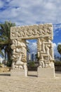 Sculpture `A belief gate` in Abrasha park in Yaffo with overlooking Tel Aviv in the background