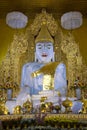 A sculpture of a Buddha in a Buddhist temple Kyauktawgyi Pagoda. Mandalay, Myanmar