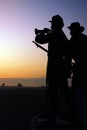 A sculpture of a Bugler greets the sunrise