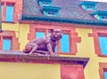 The sculpture of bulldog on the stone fence of State Archives Basel-stadt building in Basel, Switzerland