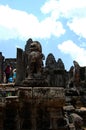 Sculpture carving ancient ruins antique building of Prasat Bayon Castle or Jayagiri Brahma Temple for Cambodian people and