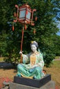 Sculpture Chines women with a street lamp, Greater China Bridge. Alexander Park of Tsarskoye Selo