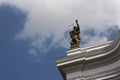 Sculpture on church ledge Royalty Free Stock Photo