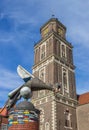 Sculpture and church tower in Coesfeld Royalty Free Stock Photo