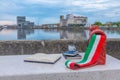 Sculpture of a coffee cup and books on a bench in Ravenna, Italy