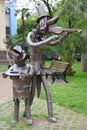 Sculpture composition of wandering artists playing the violin in Sochi