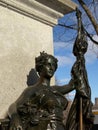 Sculpture of a crowned woman holding a flag found on Parliament hill, Ottawa