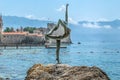 Sculpture of a dancer-ballerina against the backdrop of the Old Town of Budva Royalty Free Stock Photo