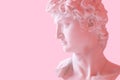 Sculpture David a pink background. 3d render illustration