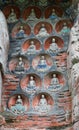 Buddha niches wall at Dazu Rock Carvings at Mount Baoding Royalty Free Stock Photo