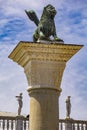 Sculpture depicting image of lion with wings, symbol of Venice, on the top of the column at San Marco, Italy Royalty Free Stock Photo