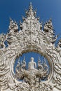 Sculpture detail with white Buddha in all-white buddhist temple Royalty Free Stock Photo