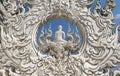 Sculpture detail with white Buddha in all-white buddhist temple Royalty Free Stock Photo