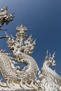 Sculpture detail with white Buddha in all-white buddhist temple Wat Rong Khun in Chiang Rai, Thailand Royalty Free Stock Photo