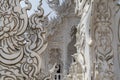 Sculpture detail with white Buddha in all-white buddhist temple Wat Rong Khun in Chiang Rai, Thailand Royalty Free Stock Photo