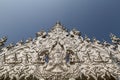 Sculpture detail with white Buddha in all-white buddhist temple Wat Rong Khun in Chiang Rai, Thailand Royalty Free Stock Photo