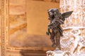 Sculpture details of rich decorated courtyard of Palazzo Vecchio in Florence