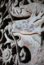 Sculpture of dragon on wall. Decorative background design