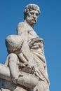 Sculpture of engineer and his scholar on Zoll Bridge in Magdeburg downtown, Germany, sunny day, blue sky