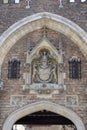 Sculpture on facade of entrance gate to Gruuthuse Museum, Bruges, Belgium Royalty Free Stock Photo