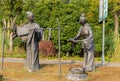 Sculpture of family life of couple with dresses of old times