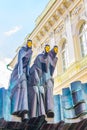 Sculpture of the Feast of the Three Musicians on roof of the National Drama Theatre, Vilnius, Lithuania...IMAGE