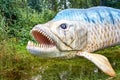 Sculpture of a fish with big sharp teeth Royalty Free Stock Photo