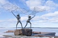 Sculpture Fishermen on the embankment of Lake Onega in Petrozavodsk, Russia