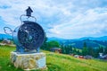 The sculpture of forged clock, Mountain Valley peppers, on July 24 in Yablunytsya, Ukraine