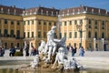 Sculpture with a fountain against the backdrop of the facade of the Schonbrunn Palace. Vienna, Austria