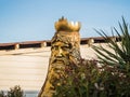 Sculpture of the god of water Neptune from a tree on sea Royalty Free Stock Photo