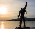 Sculpture of Freddie Mercury in sunset
