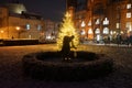 Sculpture Girl with ball in front of the lit Christmas tree in front of the Rathaus KÃÂ¶penick. Berlin, Germany Royalty Free Stock Photo