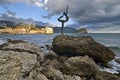 Sculpture girl dancing. Against the backdrop of the old town of Budva