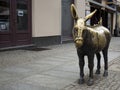 Sculpture - Golden Donkey on the streets of Torun