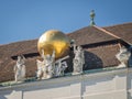 Sculpture with golden globe atop the State Hall of the Austrian National Library, Vienna, Austria Royalty Free Stock Photo