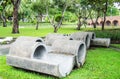 Sculpture gray concrete tube in park Royalty Free Stock Photo