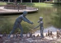 Sculpture group at the Nortel Corporate Headquarters in Richardson, Texas, featuring boys with a handmade walkie-talkie.