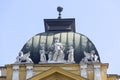 Sculpture group on the top of the old building Royalty Free Stock Photo