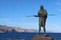 Sculpture of the Guanche king Anaterve next to the Atlantic Ocean in Candelaria, Tenerife, Spain