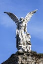 Sculpture of a Guardian angel with a sword in the cemetery of Comillas