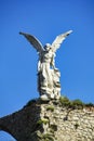 Sculpture of a Guardian angel with a sword in the cemetery of Comillas. Cantabria, Spain