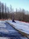 Sculpture of Gustav Ernesaks at Lauluvaljak field, famous ground for concerts at early spring with some snow left. Royalty Free Stock Photo