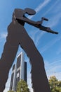 the sculpture, hammering man, designed by jonathan borofsky, near frankfurt exhibition area, frankfurt am main, germany Royalty Free Stock Photo