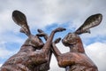 Sculpture of hares fighting