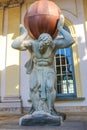 Sculpture of Hercules holding globe