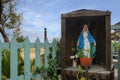 Sculpture of holy Mary in a garden in Sicily