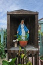 Sculpture of holy Mary in a garden in Sicily