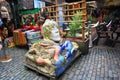 A sculpture of human head decorated with mosaic